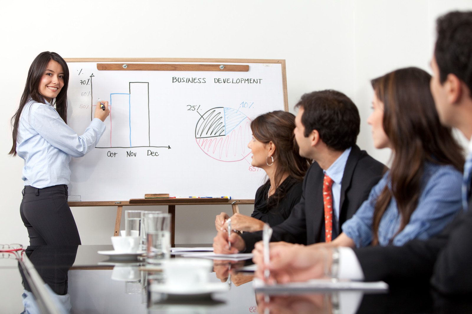 Woman Giving a Presentation with Visuals